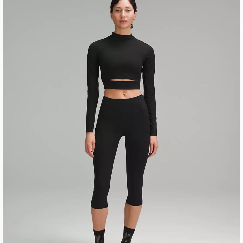 Lululemon black Fast and Free Capri Nylon/Lycra Blend with size pockets size 6